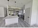 Modern kitchen featuring stainless steel appliances and an island at 1378 Wilmette St, Port Charlotte, FL 33980