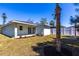 Well-maintained backyard featuring lush grass and a privacy fence at 5316 Altoona St, Sarasota, FL 34232