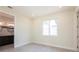 Empty bedroom features a window for natural light, and an attached bathroom at 5316 Altoona St, Sarasota, FL 34232