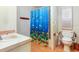 Main bathroom with a toilet and walk-in shower at 35935 Tanda Cir, Zephyrhills, FL 33541