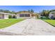 Single-wide manufactured home with covered carport at 35935 Tanda Cir, Zephyrhills, FL 33541
