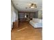 Spacious living room with built-in shelving and hardwood floors at 35935 Tanda Cir, Zephyrhills, FL 33541