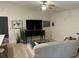 Spacious living room with a large TV and comfortable seating at 3529 65Th Avenue E Cir, Sarasota, FL 34243