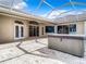 Patio with hot tub and access to house at 18065 Wing Ave, Port Charlotte, FL 33948