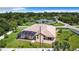 Single-Gathering home with large backyard and screened-in pool area at 18065 Wing Ave, Port Charlotte, FL 33948