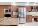 Modern kitchen with stainless steel appliances and granite countertops at 18065 Wing Ave, Port Charlotte, FL 33948