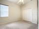 Spacious bedroom with window and closet at 18065 Wing Ave, Port Charlotte, FL 33948
