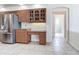 Kitchen with built-in desk and access to a nearby bathroom at 18065 Wing Ave, Port Charlotte, FL 33948