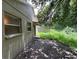 Home features a spacious backyard with a partially fenced area at 6115 Sand Key Ln, Wesley Chapel, FL 33545