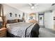 King-size bed in spacious main bedroom with access to en-suite bathroom at 12377 Fillmore St, Spring Hill, FL 34609