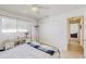 Bedroom with queen bed, built-in shelving, and large closet at 12377 Fillmore St, Spring Hill, FL 34609