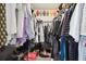 Large walk-in closet with ample shelving and hanging space at 12377 Fillmore St, Spring Hill, FL 34609