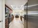 Kitchen with stainless steel appliances and a dining area at 12377 Fillmore St, Spring Hill, FL 34609