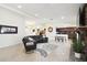 Spacious living room features a stone fireplace and an open floor plan at 12377 Fillmore St, Spring Hill, FL 34609