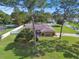 Aerial view of a one-story house with a large yard at 12377 Fillmore St, Spring Hill, FL 34609