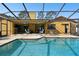 Large screened in pool with plenty of space for sunbathing at 12377 Fillmore St, Spring Hill, FL 34609