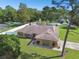 Aerial view of a one-story house with a large yard at 12377 Fillmore St, Spring Hill, FL 34609