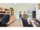 Spacious home office with views to kitchen and living areas at 12377 Fillmore St, Spring Hill, FL 34609