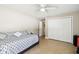 Bedroom with daybed, double door closet and access to bathroom at 12377 Fillmore St, Spring Hill, FL 34609
