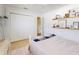 Bedroom with twin bed, built-in shelving, and large closet at 12377 Fillmore St, Spring Hill, FL 34609