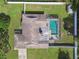 Directly above view of a home with a private pool and fenced backyard at 12377 Fillmore St, Spring Hill, FL 34609
