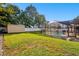 Spacious backyard with a shed and a screened pool area at 12377 Fillmore St, Spring Hill, FL 34609
