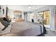 Main bedroom with sliding glass doors leading to a patio at 12377 Fillmore St, Spring Hill, FL 34609