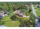 Aerial view of the house and surrounding neighborhood at 12377 Fillmore St, Spring Hill, FL 34609