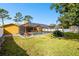 Relaxing pool area with a screened enclosure at 12377 Fillmore St, Spring Hill, FL 34609