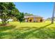 Single-story home with stone accents and a large yard at 12377 Fillmore St, Spring Hill, FL 34609