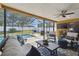 Relaxing screened-in patio overlooking a refreshing pool at 12377 Fillmore St, Spring Hill, FL 34609