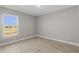 Well-lit bedroom with a window and neutral decor at 3841 San Pedro Ave, North Port, FL 34288