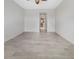 Empty bedroom with tile floors and ample natural light at 7615 Campus Cv, Sarasota, FL 34243