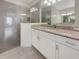 Bathroom with a large shower and granite countertop at 7615 Campus Cv, Sarasota, FL 34243