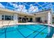 Enjoy this amazing screened in pool with turtle tile accents at 265 Belvedere Ct, Punta Gorda, FL 33950