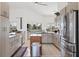 Eat-in kitchen with granite countertops, stainless steel appliances, and island at 265 Belvedere Ct, Punta Gorda, FL 33950