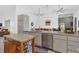 Modern kitchen with granite countertops, stainless steel appliances, and an island at 265 Belvedere Ct, Punta Gorda, FL 33950