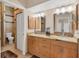 Elegant bathroom with double sinks, granite countertop, and a separate shower at 265 Belvedere Ct, Punta Gorda, FL 33950