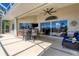 Covered lanai with seating area, and pool access at 265 Belvedere Ct, Punta Gorda, FL 33950
