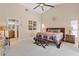 Comfortable main bedroom with a king-size bed and an ensuite bathroom at 265 Belvedere Ct, Punta Gorda, FL 33950