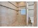 Large walk-in shower with tile surround and built-in shelving at 265 Belvedere Ct, Punta Gorda, FL 33950
