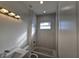 Clean bathroom with a tub and shower combination at 399 Giovanni Dr, Nokomis, FL 34275