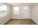 Bright living room with new flooring and neutral walls at 6912 Amarillo St, Port Richey, FL 34668