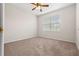 Spacious bedroom with carpeted floors and ceiling fan at 12904 Sanctuary Cove Dr # 301, Temple Terrace, FL 33637