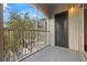 Private balcony with screen enclosure, overlooking trees at 12904 Sanctuary Cove Dr # 301, Temple Terrace, FL 33637