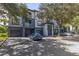 Apartment building exterior with parking and landscaping at 12904 Sanctuary Cove Dr # 301, Temple Terrace, FL 33637
