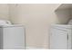 Convenient laundry area with full-sized washer and dryer at 12904 Sanctuary Cove Dr # 301, Temple Terrace, FL 33637