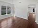 Dining room with hardwood floors and chandelier at 3943 Chaucer Way, Land O Lakes, FL 34639