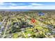 Aerial view showing home location in a residential neighborhood near the water at 3323 Elkcam Blvd, Port Charlotte, FL 33952