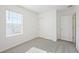 Bedroom with double door closet and window at 168 Lazy Shore Dr, Nokomis, FL 34275